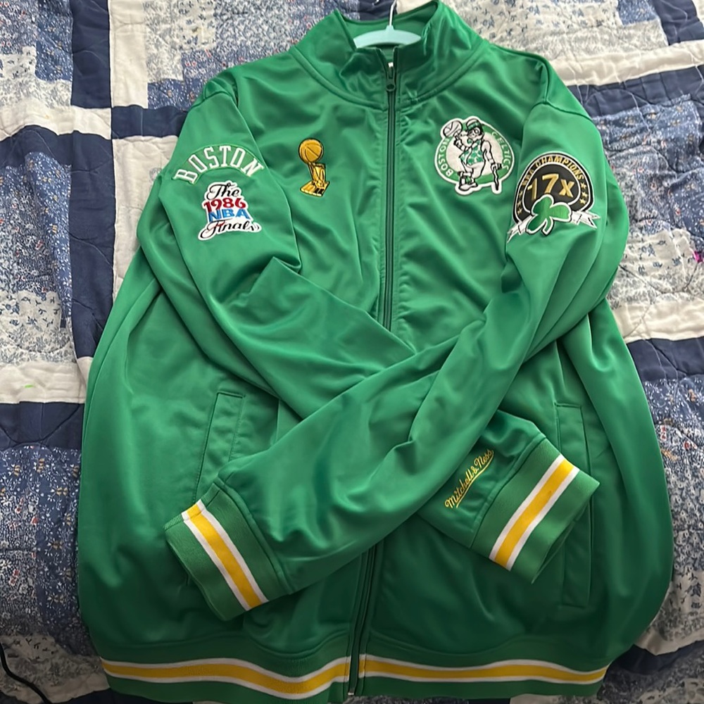 Selling a green Celtics jacket size 2XL.